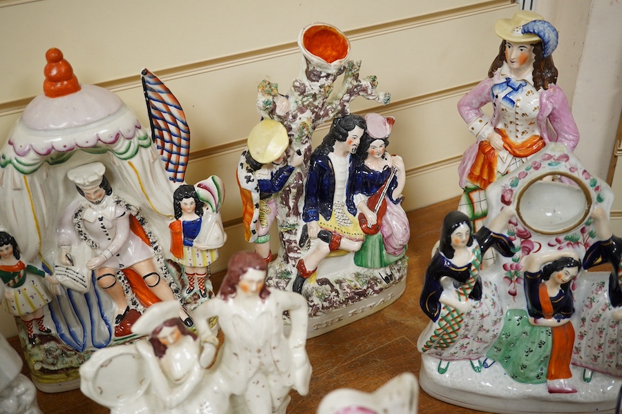 Fourteen various large Staffordshire figures, tallest 43cm. Condition - varies